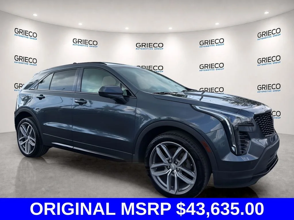 Used 2019 Gray Cadillac Sport image 1