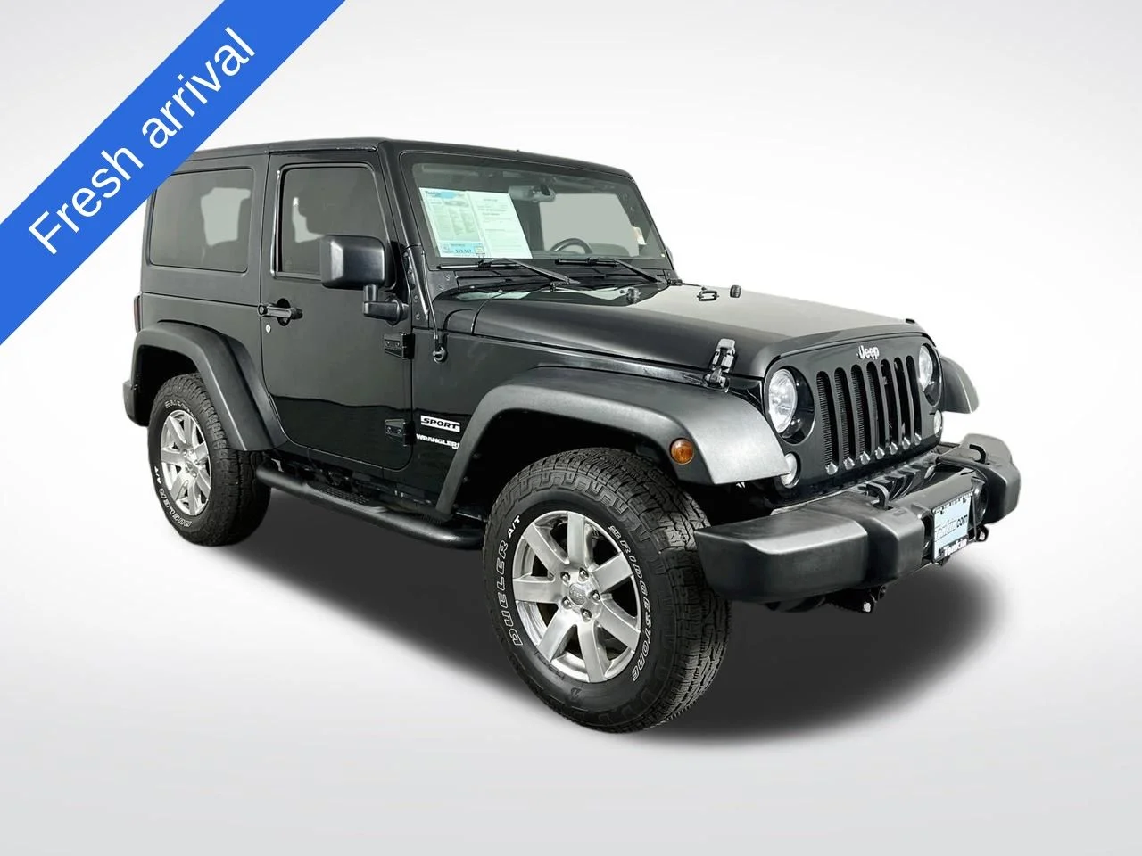 Used 2018 Black Clearcoat Jeep Sport image 1