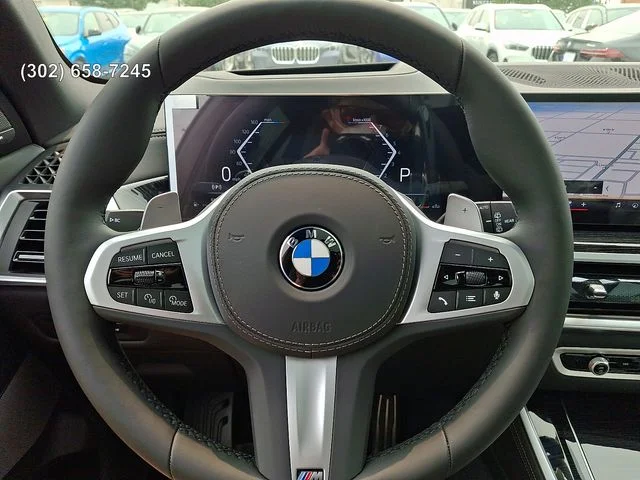 New 2026 Black Sapphire Metallic BMW xDrive40i image 18