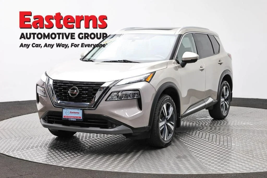 Used 2021 Gold Nissan SL image 1