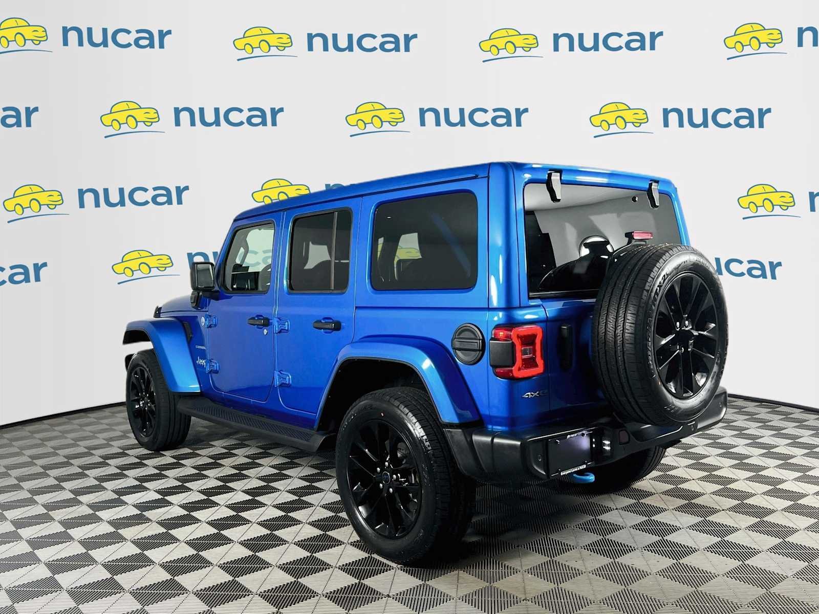 Used 2024 Hydro Blue Pearlcoat Jeep Sahara image 5