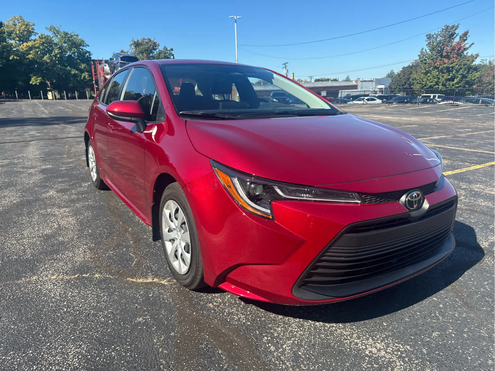 Used 2024 Ruby Flare Pearl Toyota LE image 11
