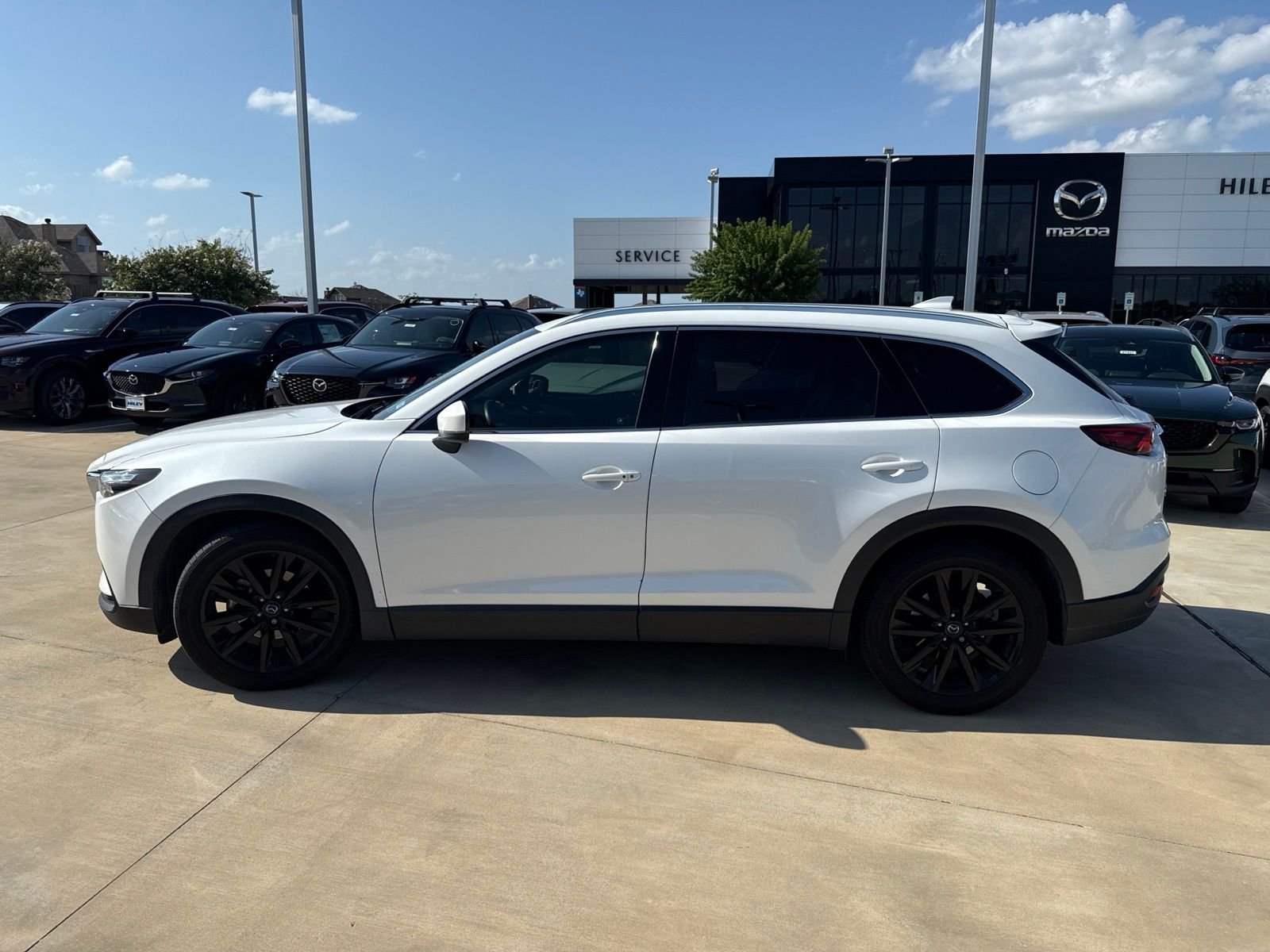 Used 2022 Snowflake White Pearl Mica Mazda Touring Plus image 7