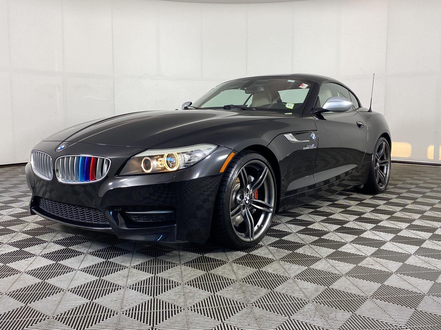 Used 2011 Black Sapphire Metallic BMW sDrive35is image 12