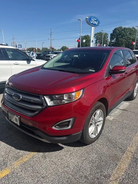 Used 2016 Red Ford SEL image 1