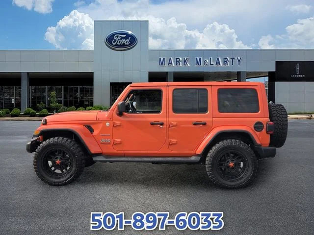 Used 2020 Orange Jeep Unlimited Sahara image 2