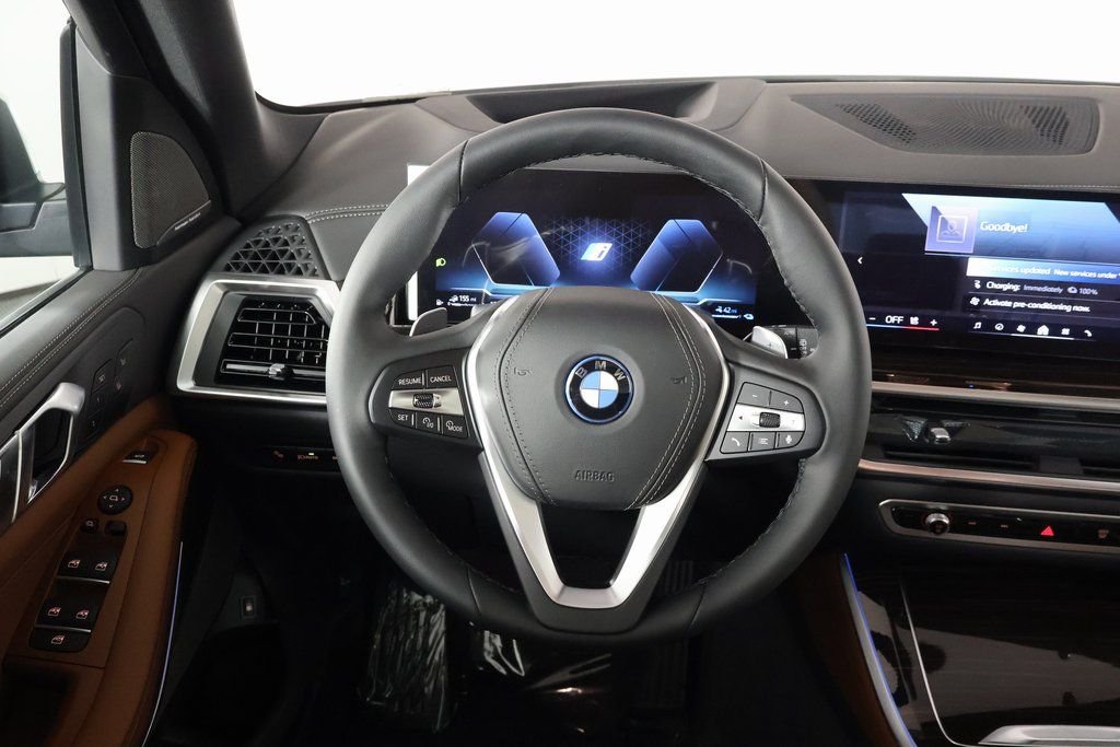 New 2026 Mineral White Metallic BMW xDrive50e image 3
