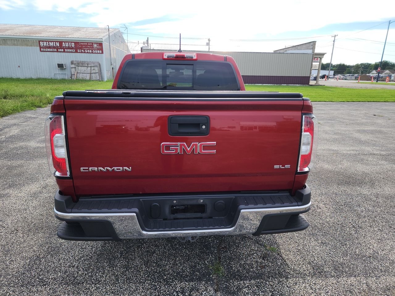 Used 2016 COPPER RED METALLIC GMC 4WD SLE image 7