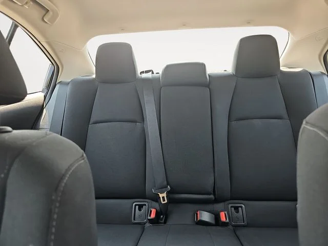 Used 2024 Black Toyota LE image 11