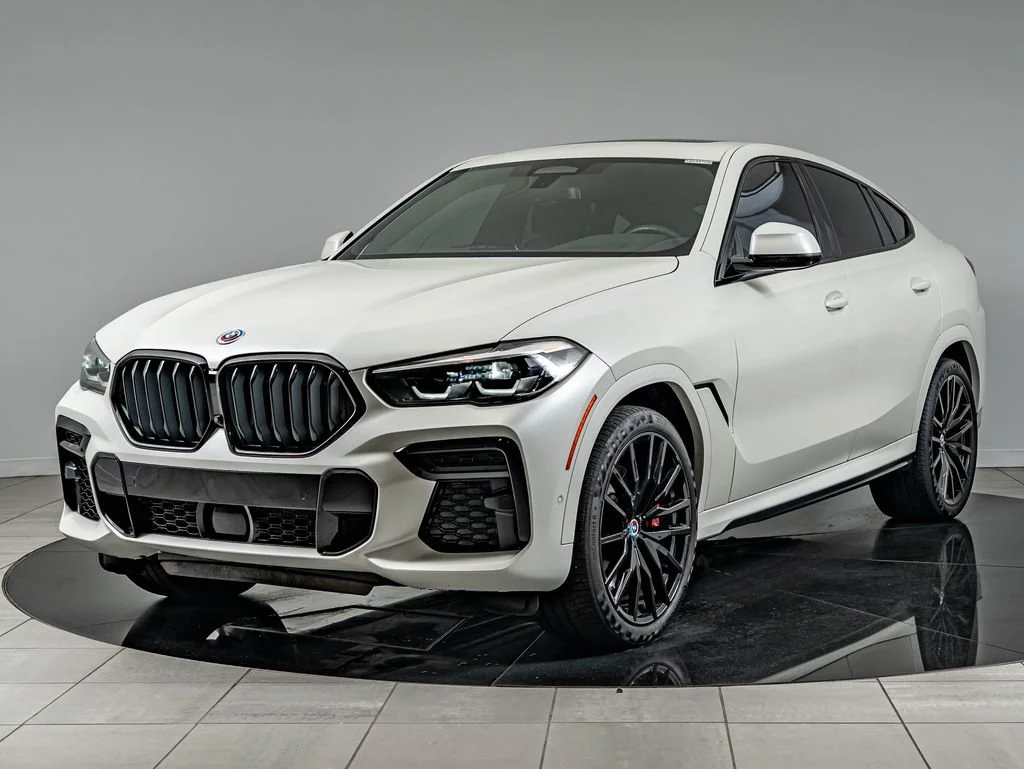 Used 2023 Frozen Brilliant White Metallic BMW M50i image 1