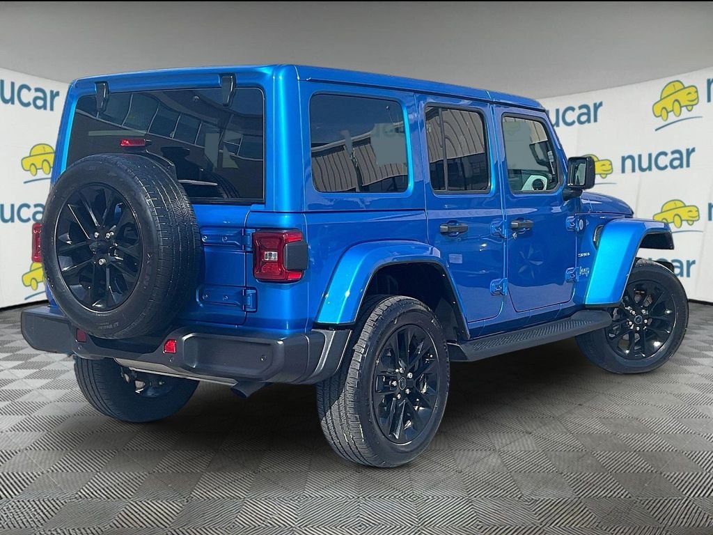 Used 2024 Blue Jeep Sahara 4xe image 6