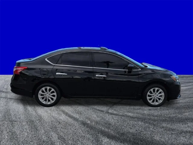 Used 2017 Black Nissan SV image 3