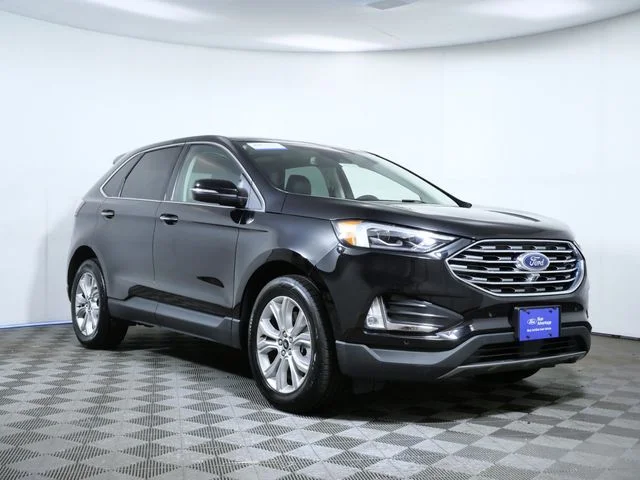 Used 2023 Black Ford Titanium image 1