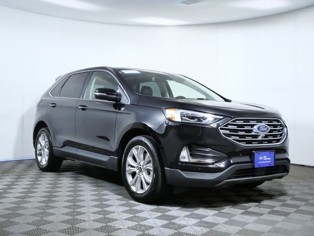 Certified Used 2023 Black Ford Titanium image 1