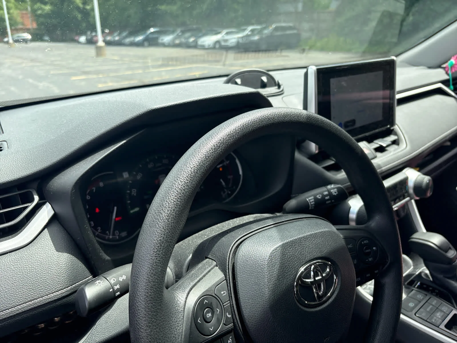 Used 2024 Midnight Black Metallic Toyota LE image 13