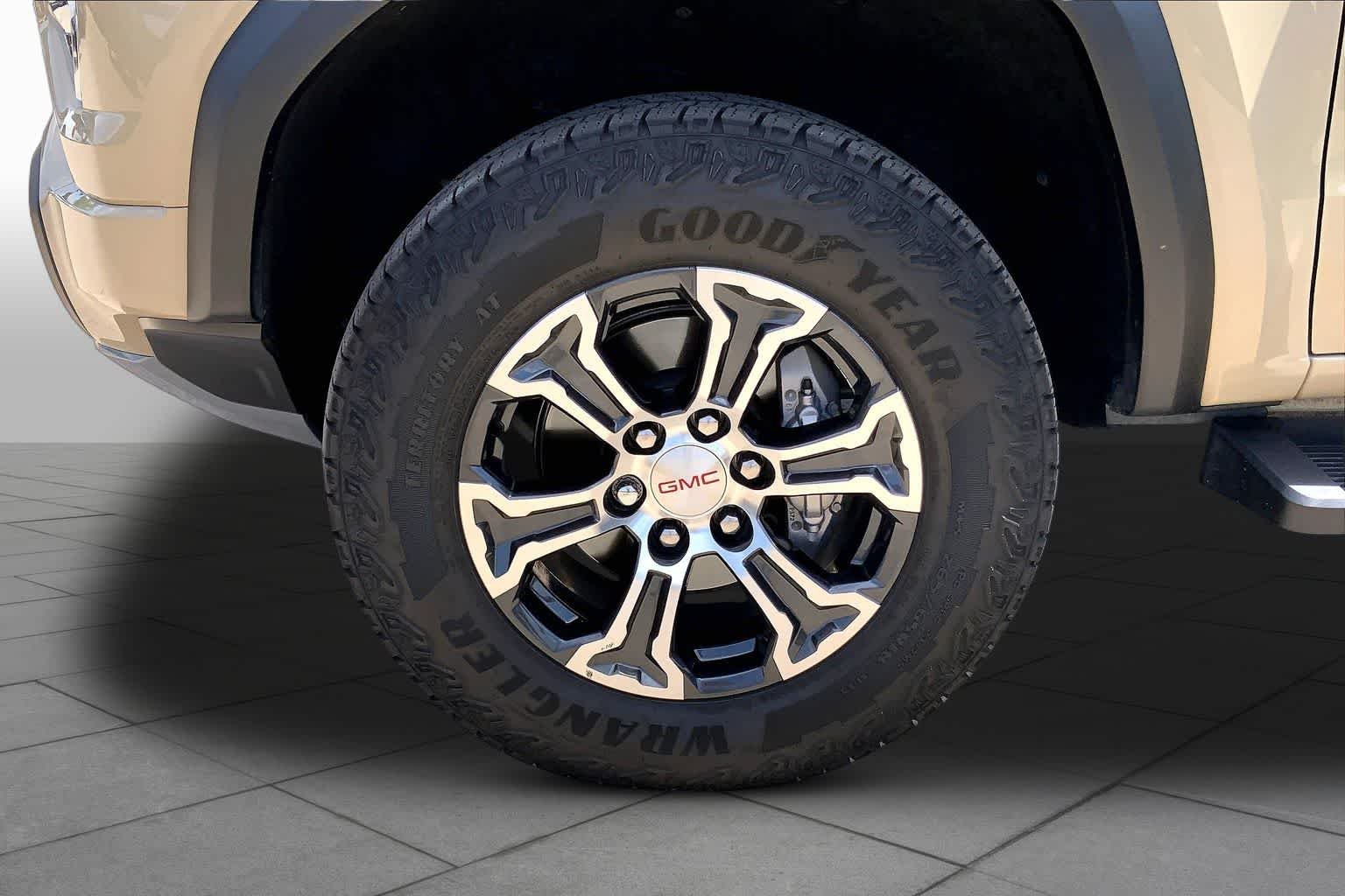 Used 2024 Desert Sand Metallic GMC 4WD AT4 image 11