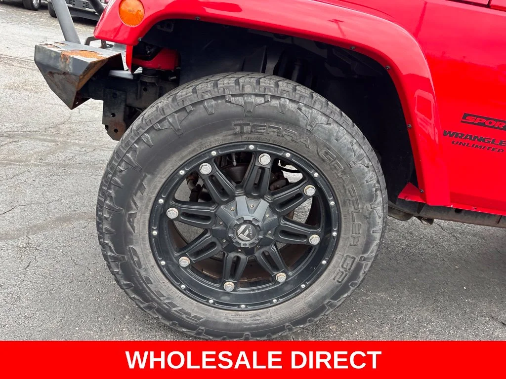 Used 2015 Red Jeep Unlimited Sport image 9