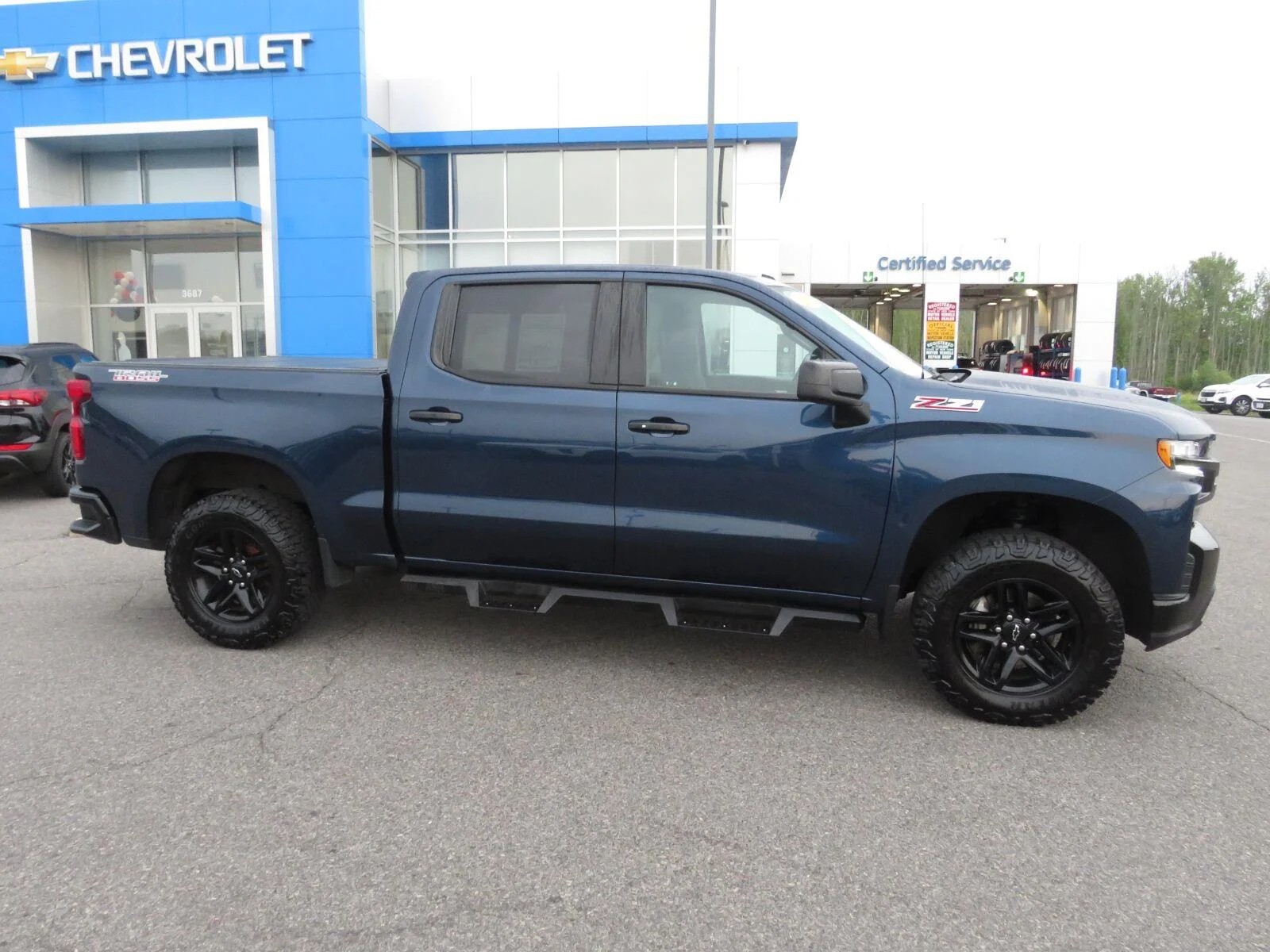 Used 2021 NORTHSKY BLUE METALLIC Chevrolet LT Trail Boss image 6