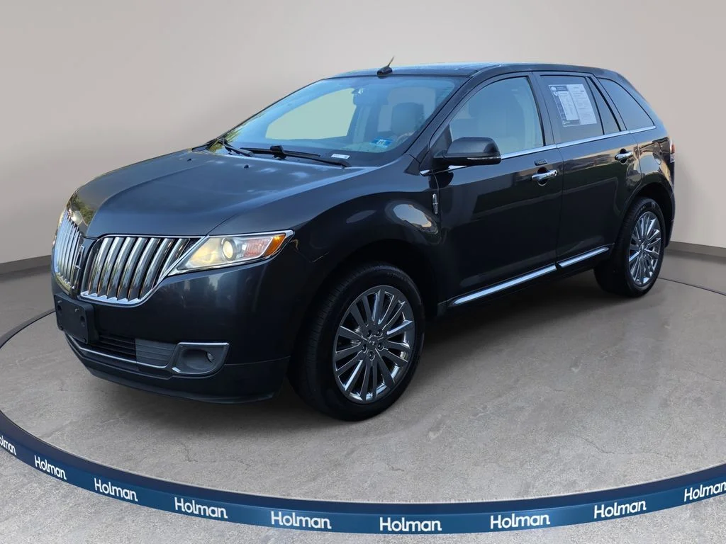 Used 2014 Smoked Quartz Metallic Tinted Clearcoat Lincoln Base image 1