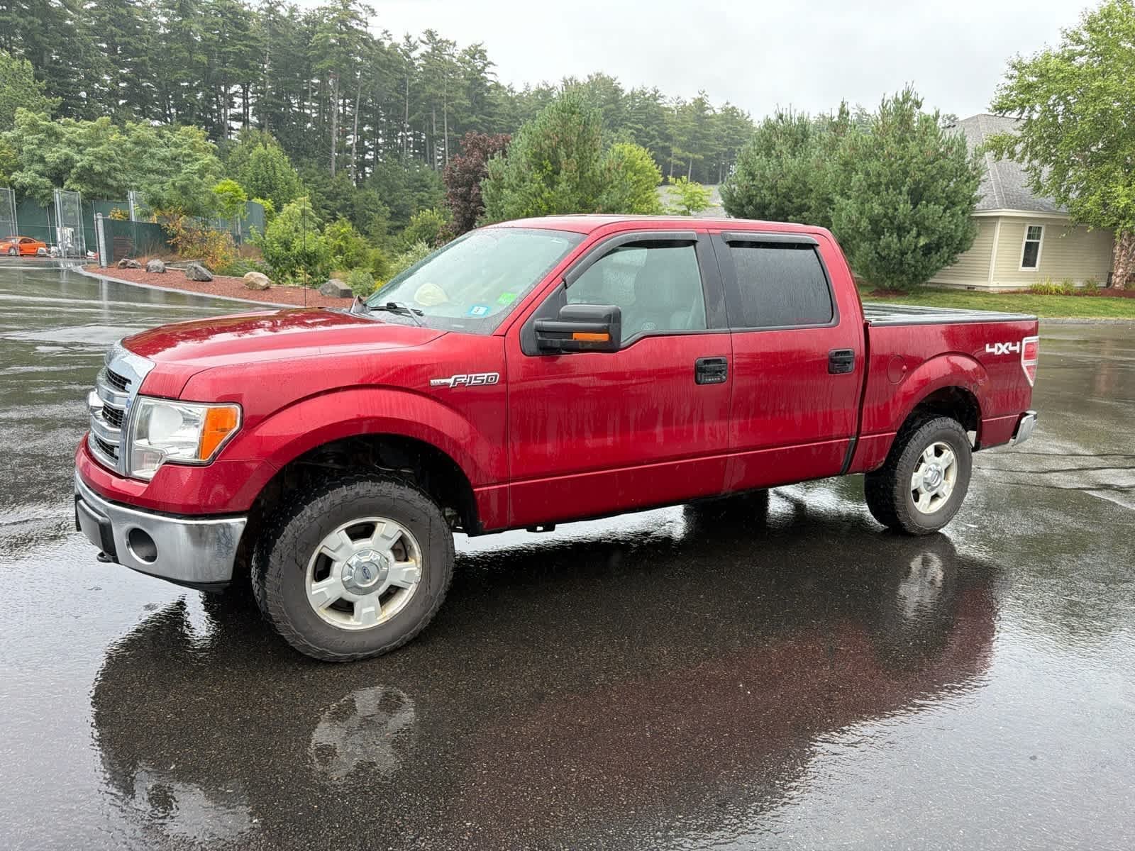 Used 2013 Ruby Red Tinted Clearcoat Metallic Ford XLT image 1