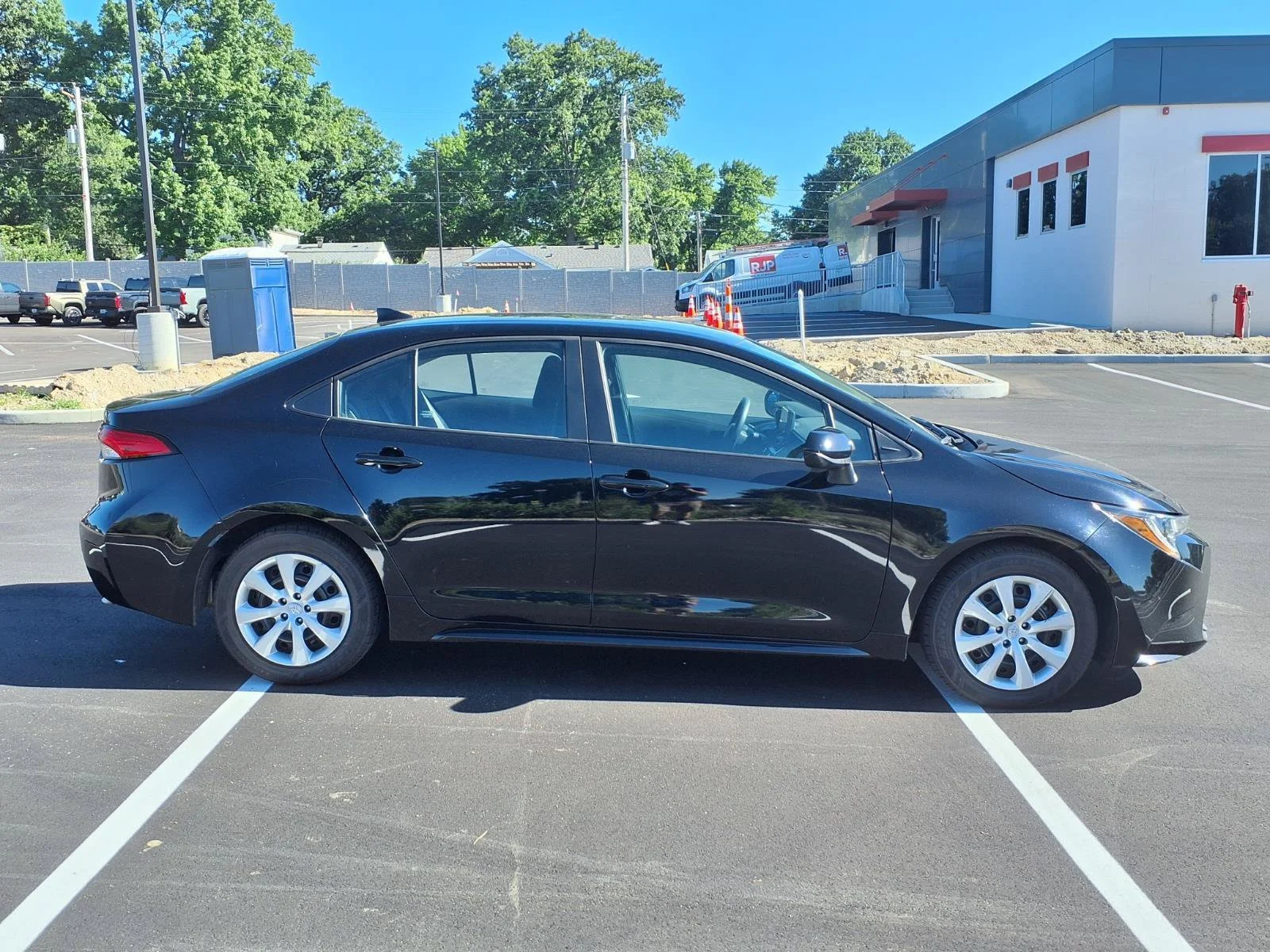 Certified Used 2024 Midnight Black Metallic Toyota LE image 2