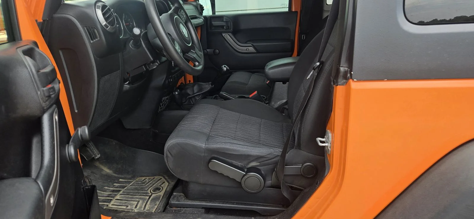 Used 2012 Orange Jeep Sport image 6