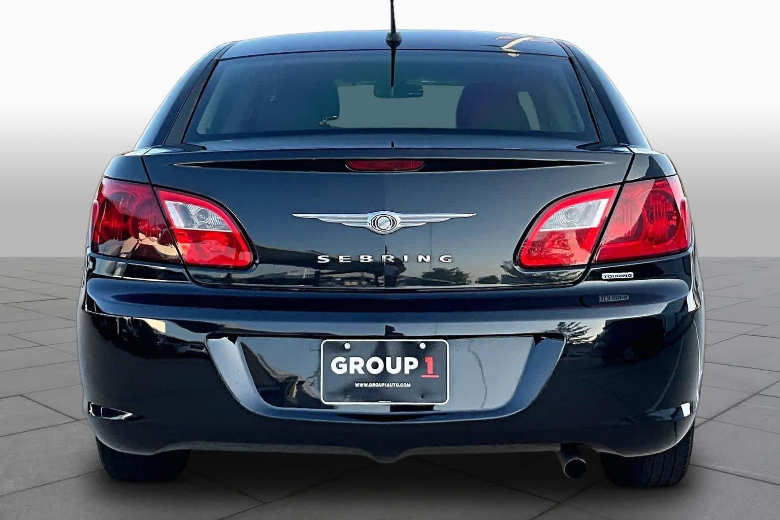 Used 2010 Brilliant Black Crystal Pearl Chrysler Touring image 4