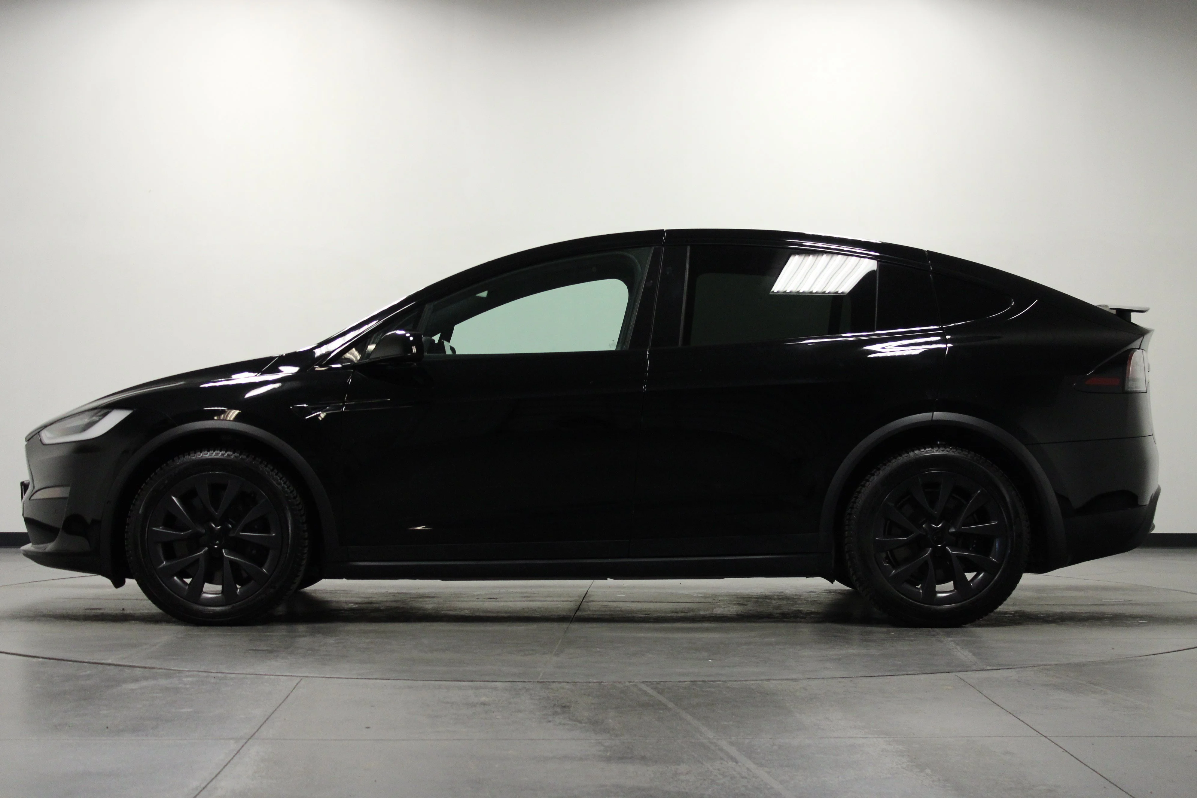 Used 2023 Solid Black Tesla Base image 7