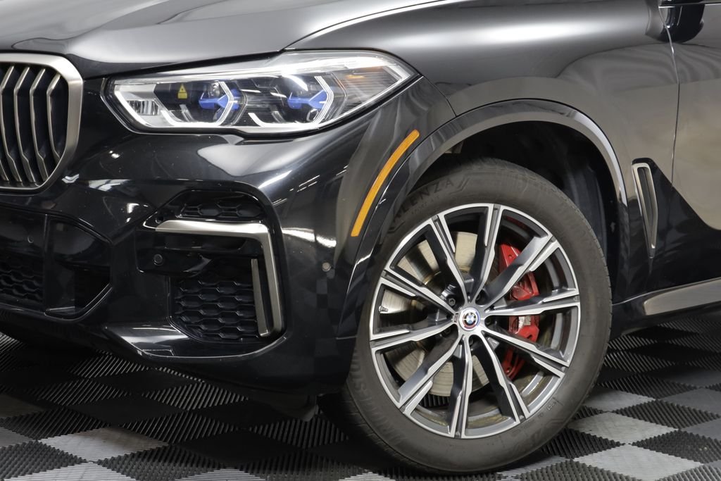 Used 2023 Black Sapphire Metallic BMW M50i image 3