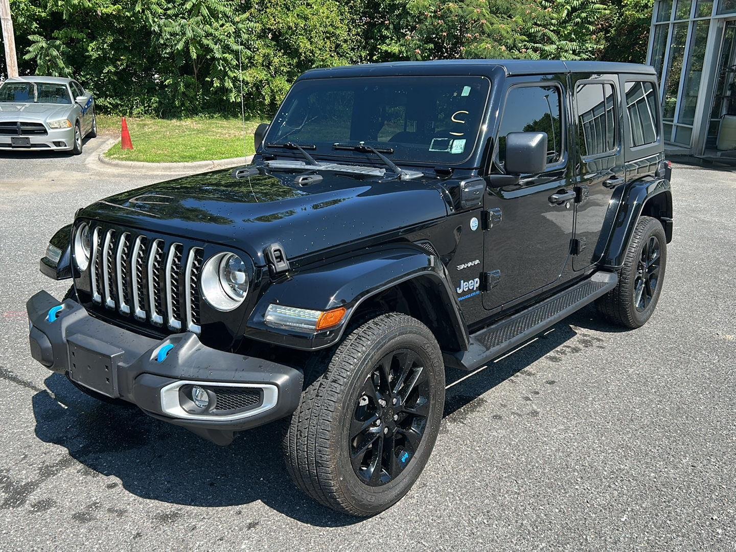 Used 2023 Black Clearcoat Jeep Sahara image 1