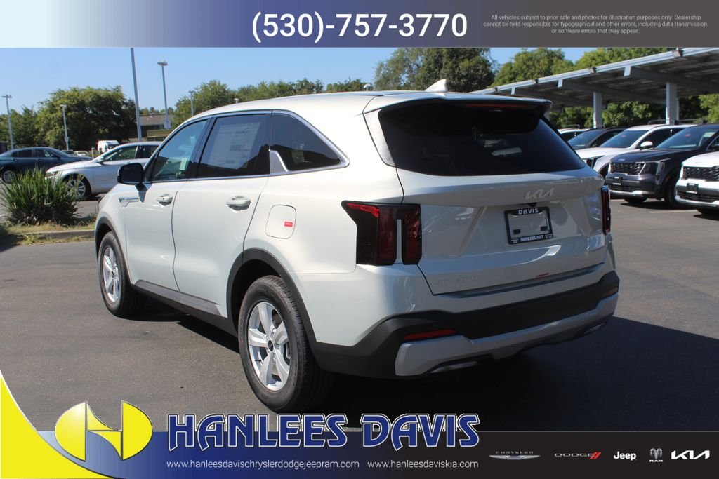 New 2026 Ivory Silver Kia LX image 9