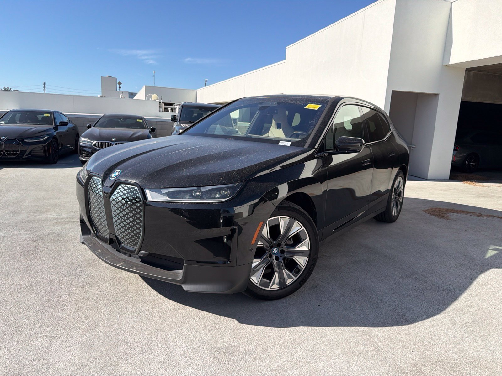 Used 2024 Black Sapphire Metallic BMW xDrive50 image 3