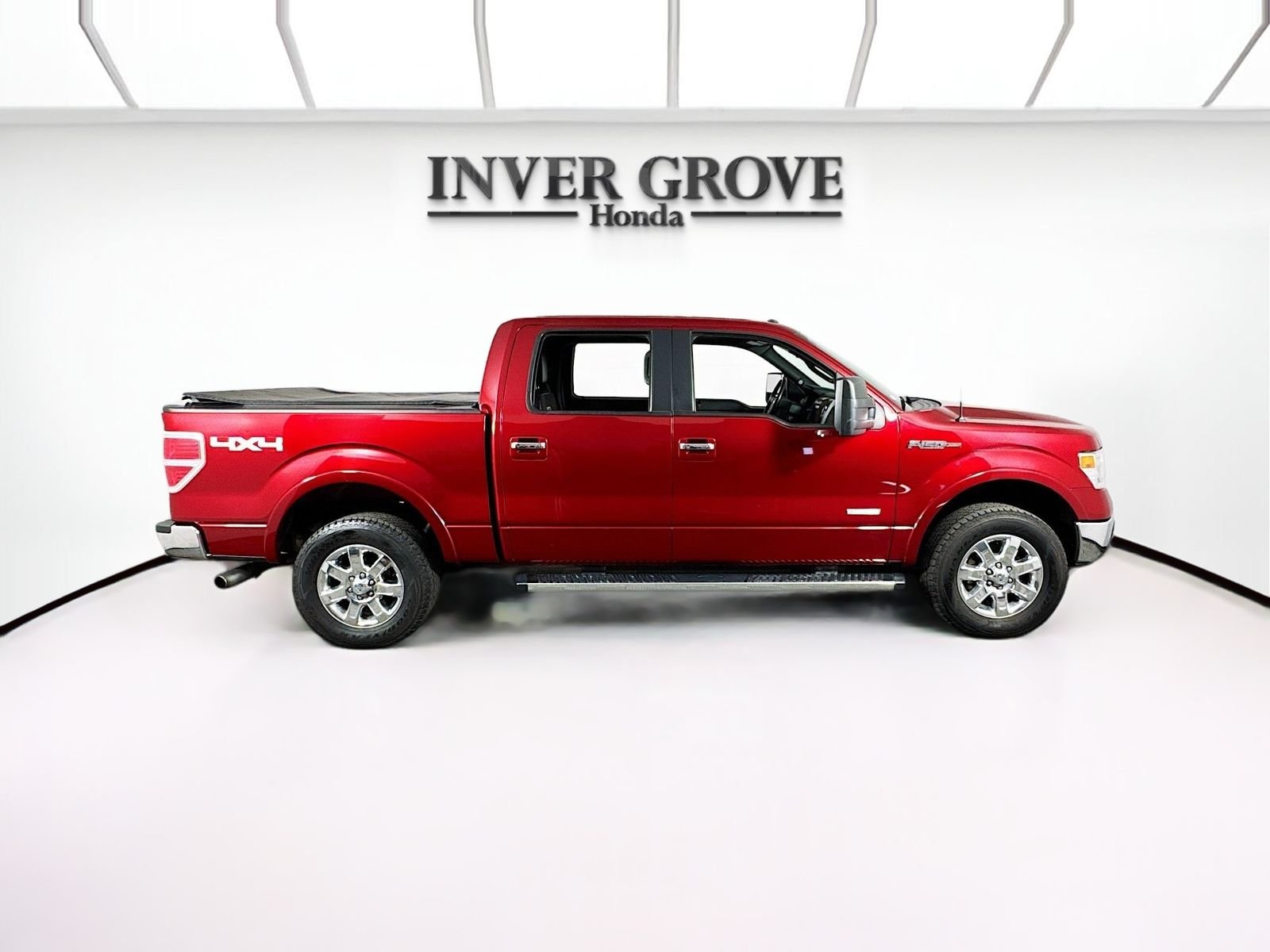 Used 2013 Ruby Red Metallic Ford Lariat image 4