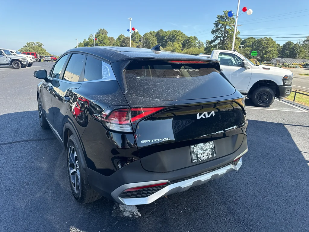 Used 2024 Ebony Black Kia EX image 7