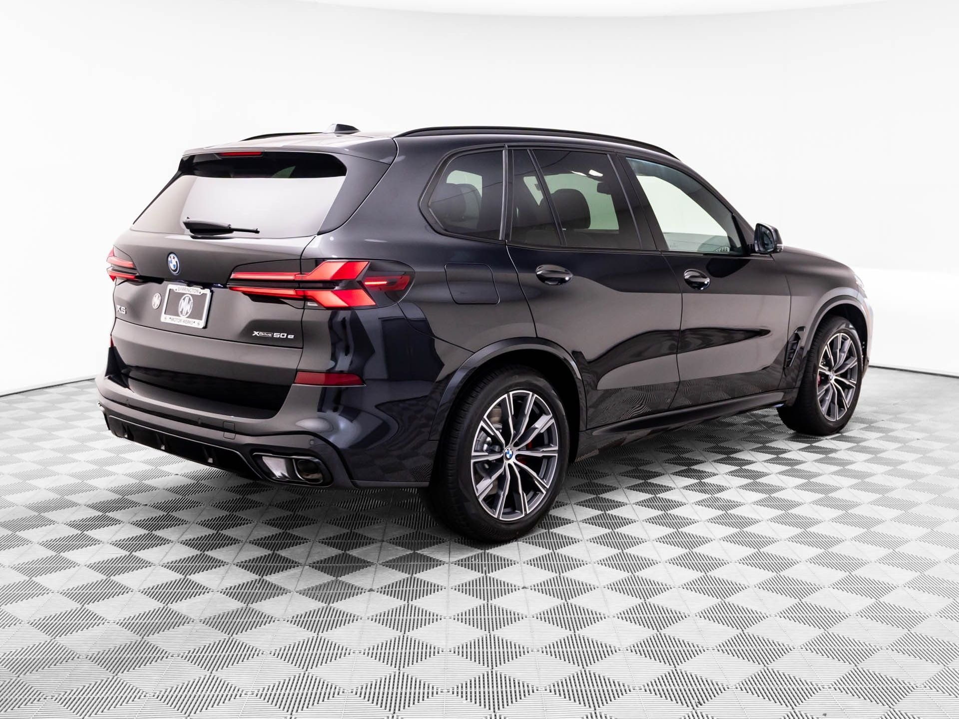New 2026 Black Sapphire Metallic BMW xDrive50e image 6