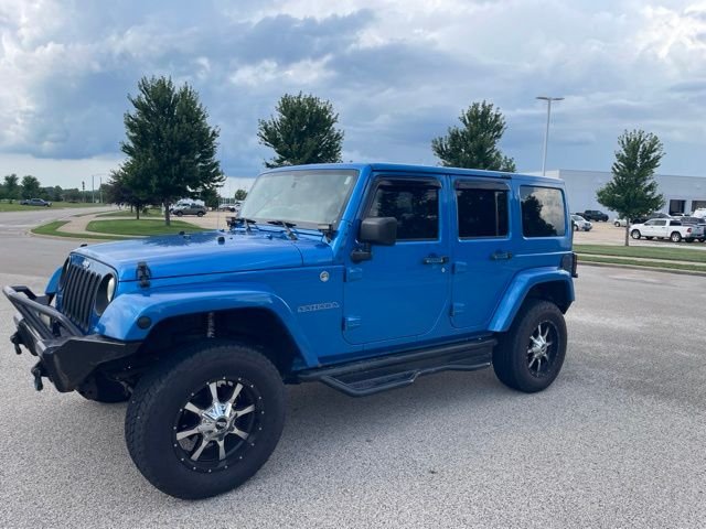 Used 2015 Blue Jeep Unlimited Sahara image 6