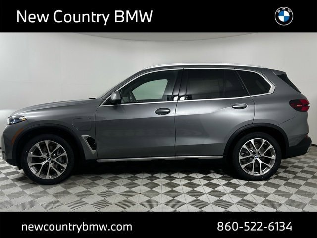 Used 2026 Skyscraper Grey Metallic BMW xDrive50e image 4