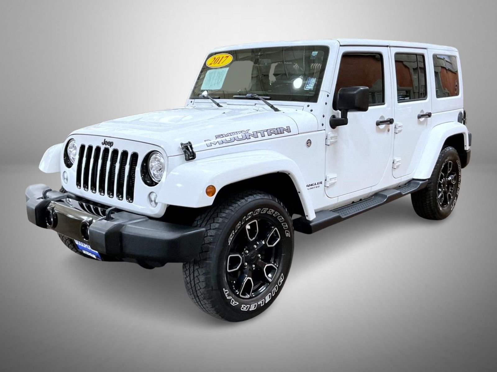 Used 2017 White Jeep Unlimited Sahara image 1