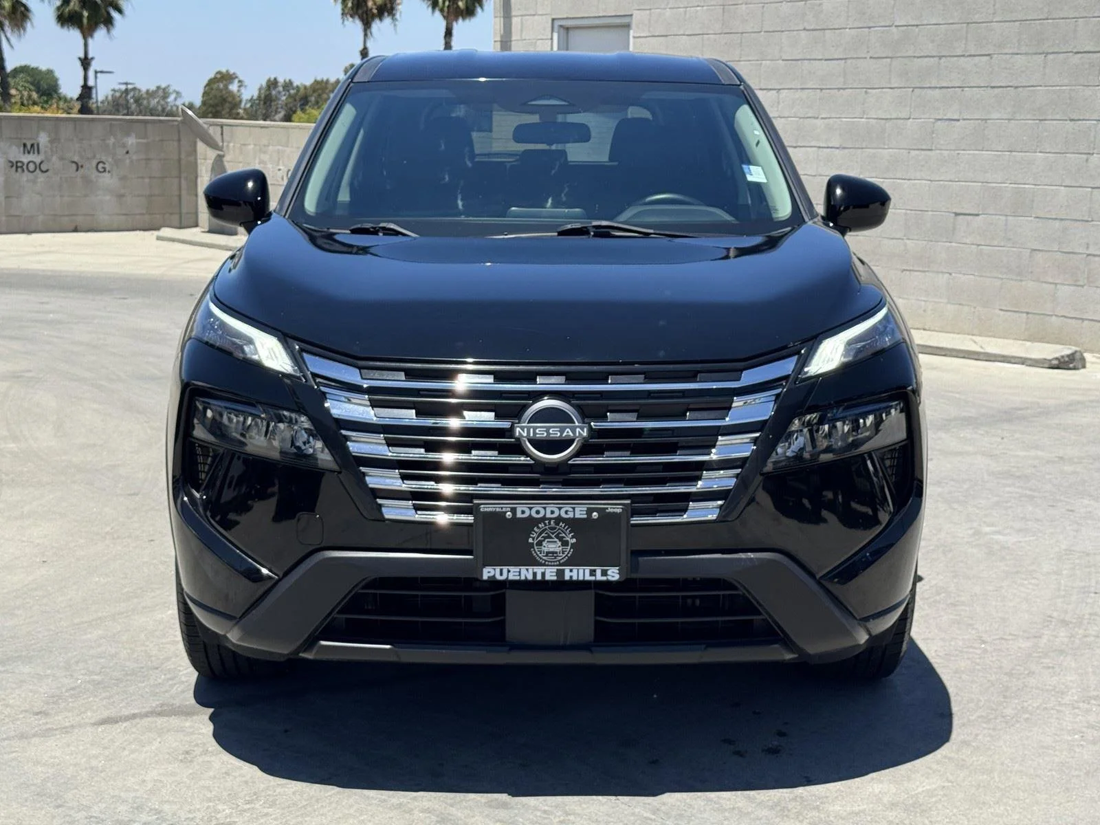 Used 2024 Super Black Nissan SV image 2