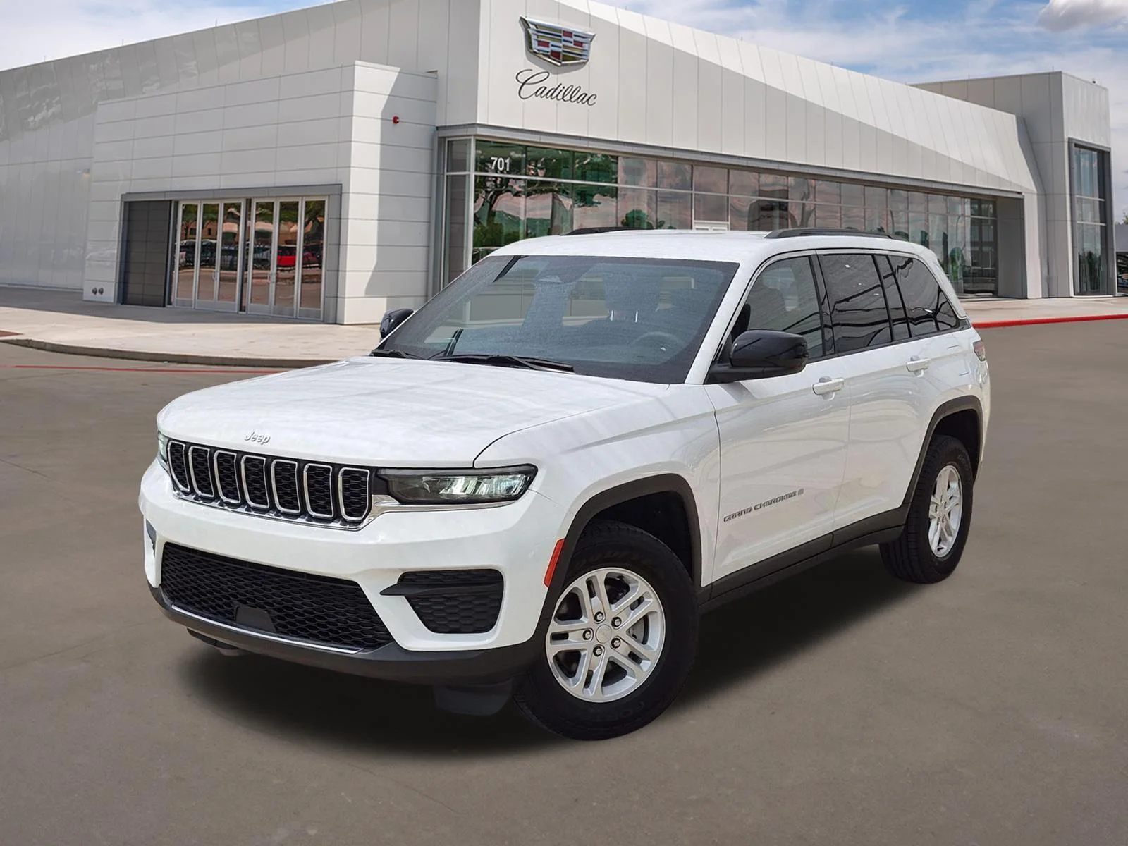 Used 2024 Bright White Clearcoat Jeep Laredo image 1