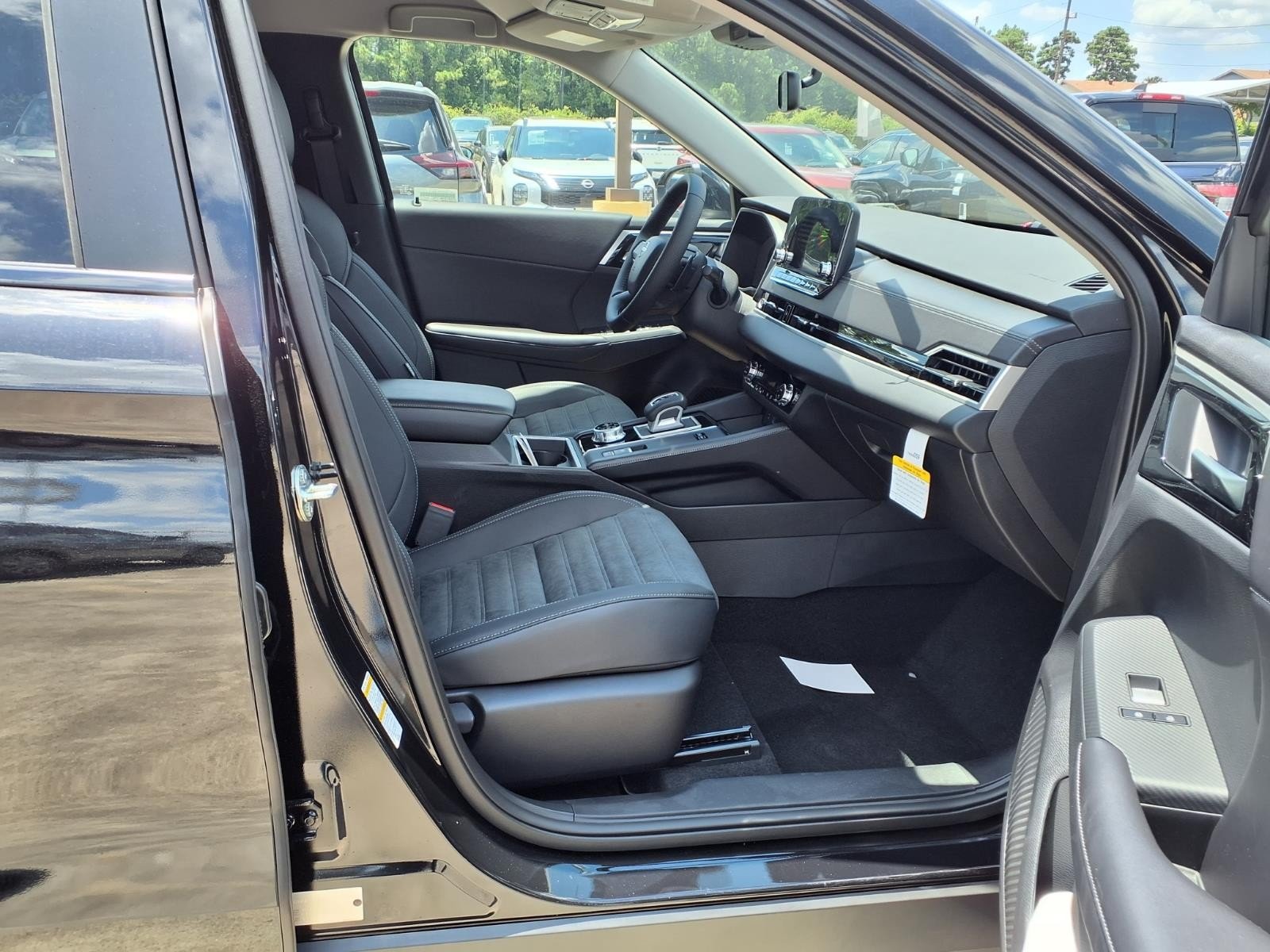 2026 Nissan Rogue Plug-In Hybrid SL Black at Sterling McCall Nissan
