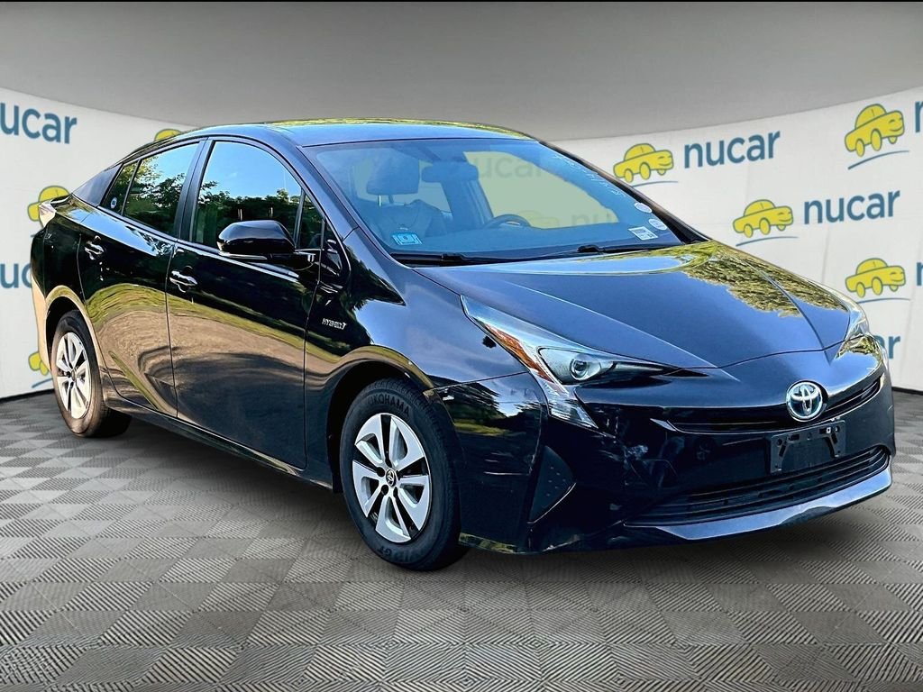 Used 2016 Black Toyota Three image 1