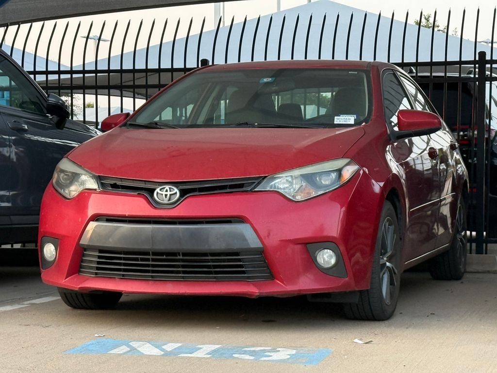 Used 2016 Barcelona Red Metallic Toyota LE Plus image 1