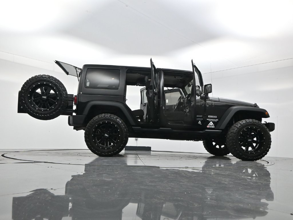 Used 2014 Black Clearcoat Jeep Unlimited Sport image 57