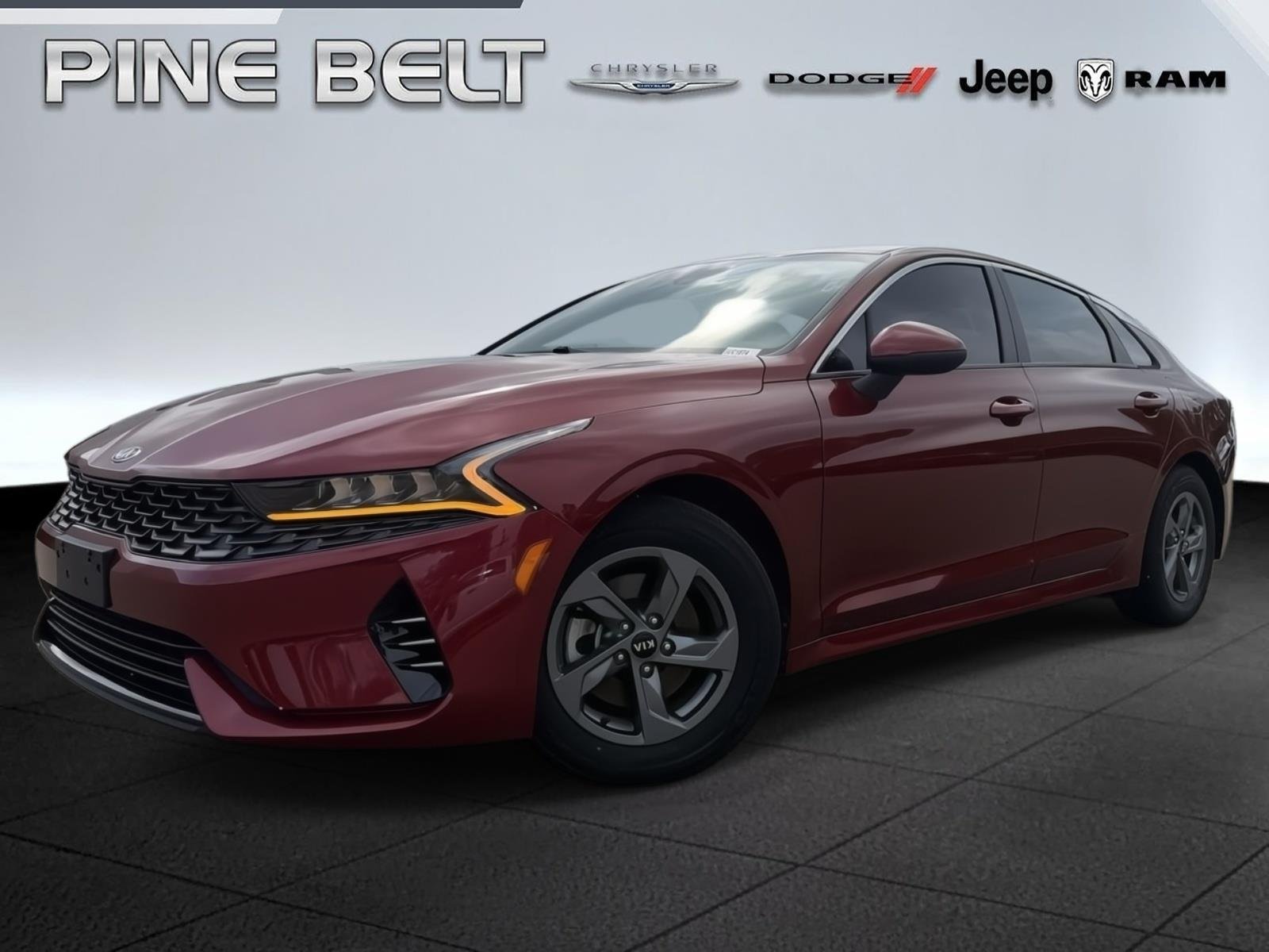 Used 2021 Passion Red Tintcoat Kia LXS image 1
