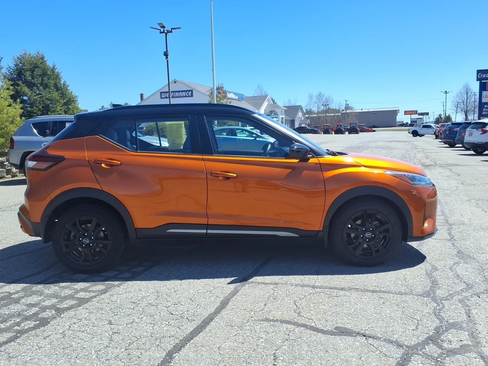 Used 2023 Orange Metallic Nissan SR image 4