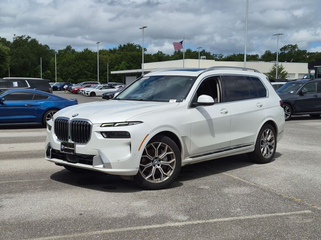 Used 2023 Mineral White Metallic BMW xDrive40i image 1