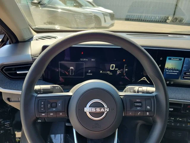 New 2026 Super Black Nissan SV image 13
