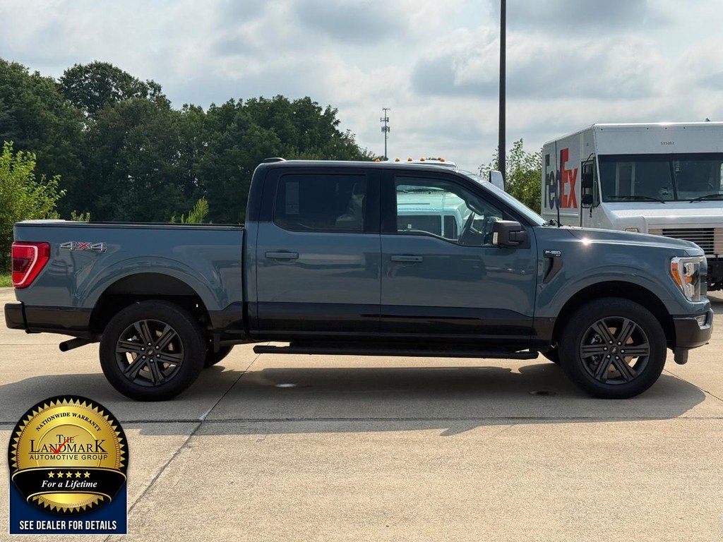 Used 2023 Area 51 Blue Ford XLT 4WD SuperCrew 6.5