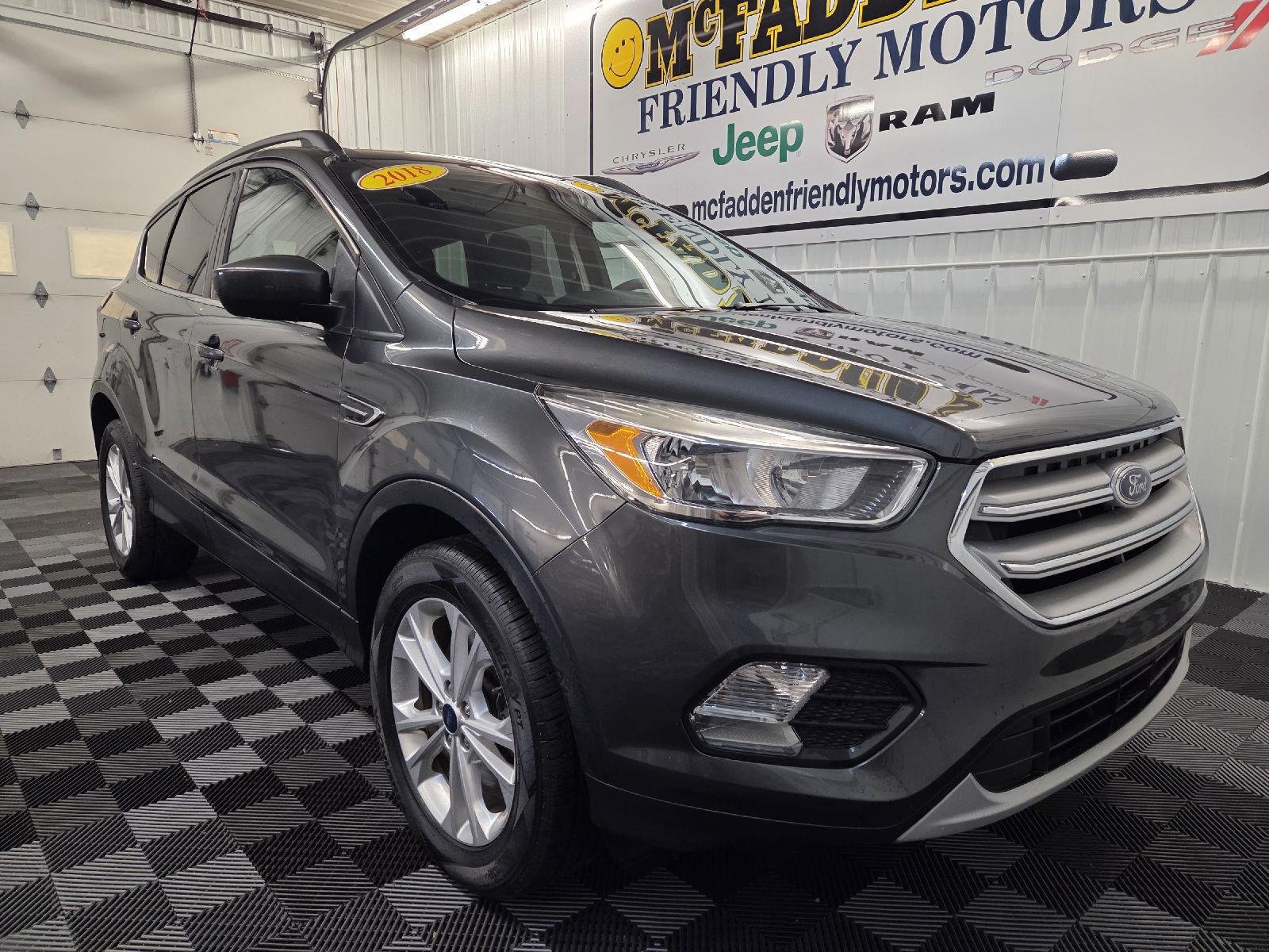 Used 2018 Ford Escape SE with VIN 1FMCU9GD7JUA53797 for sale in South Haven, MI